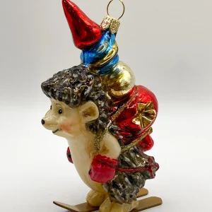 Komozja Der Igel bringt die Christbaumspitze auf den Skiern, KOMOZJA MOSTOWSKI
