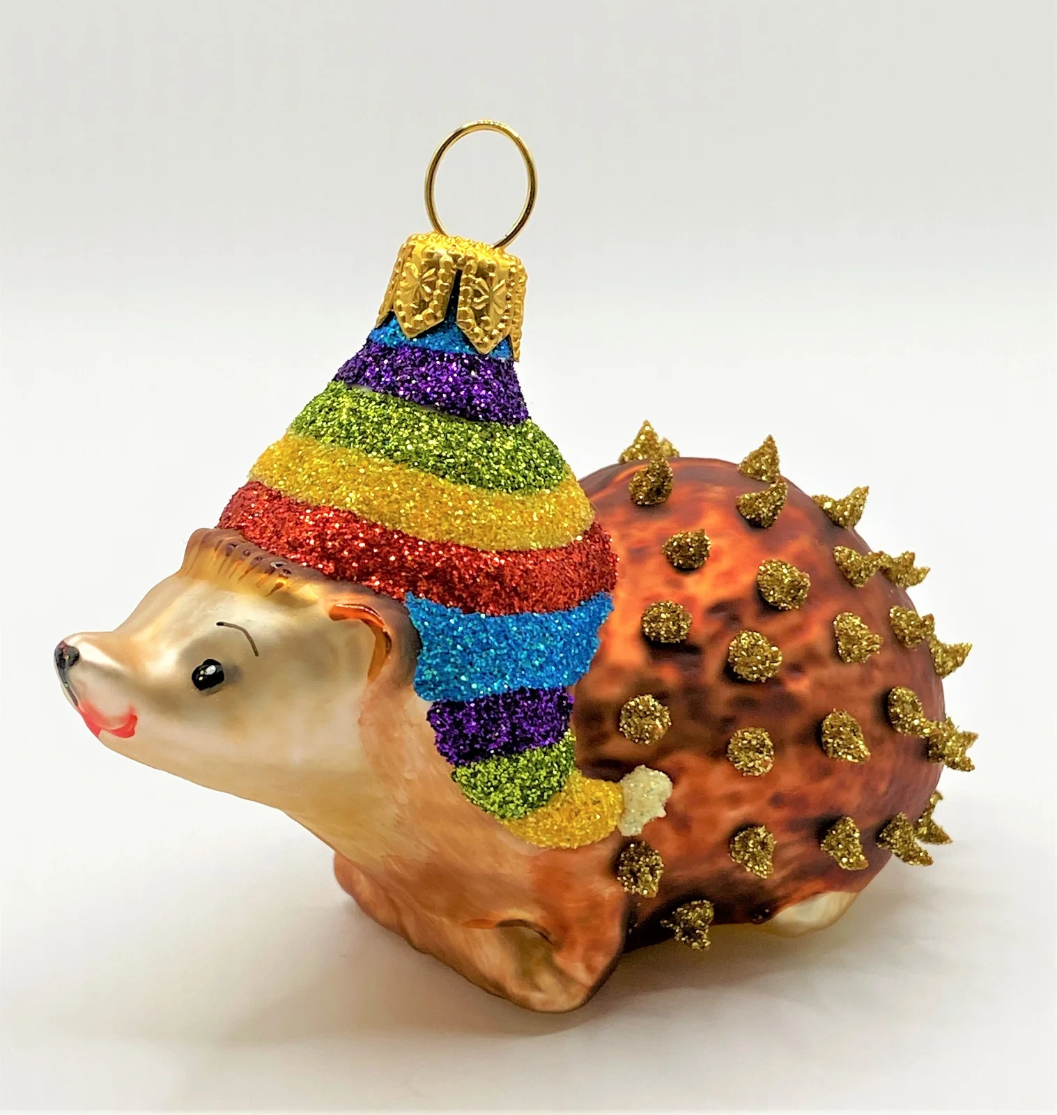 Hanco Süsser Igel mit bunter Bommel-Mütze