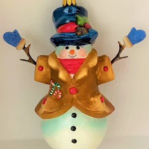 Komozja Schneemann mit blauen Handschuhen, KOMOZJA MOSTOWSKI