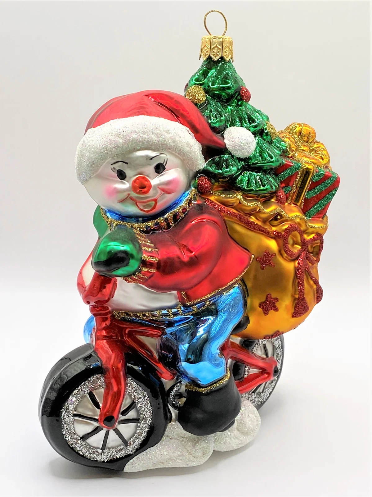 Glassware Der Schneemann bringt der Christbaum mit dem Fahrrad