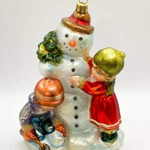 Komozja Die Kinder haben viel Spass beim Schneemann bauen, KOMOZJA MOSTOWSKI
