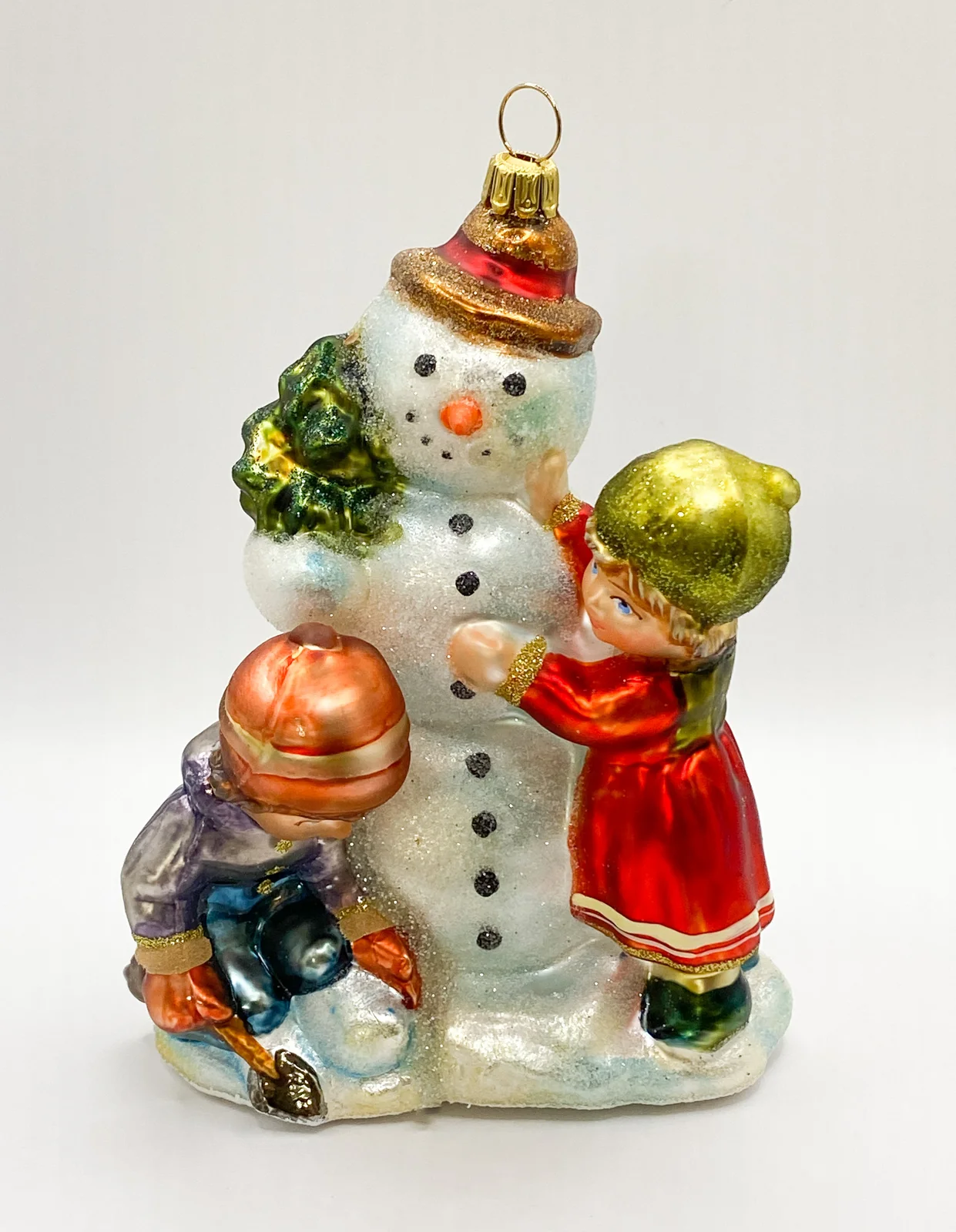 Komozja Die Kinder haben viel Spass beim Schneemann bauen, KOMOZJA MOSTOWSKI