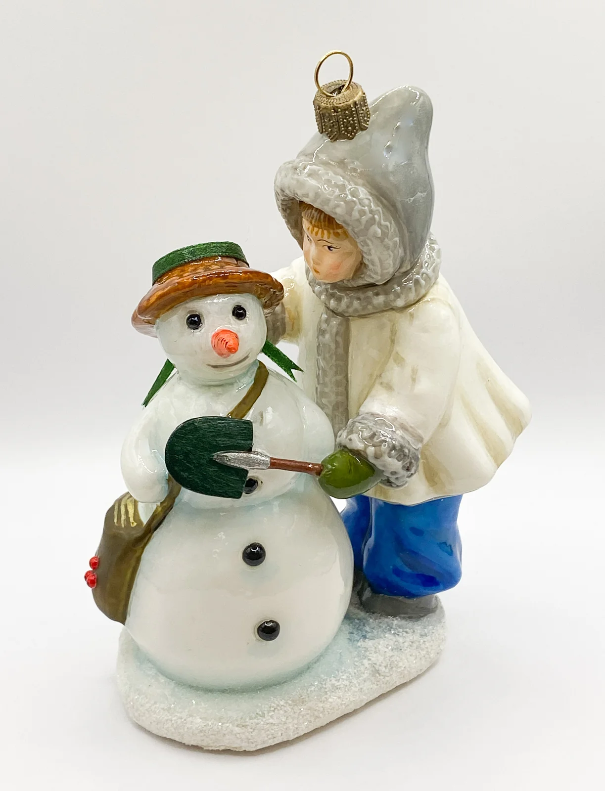 Atlas Das Kind gibt dem Schneemann seinen Strohhut, AtlasArt