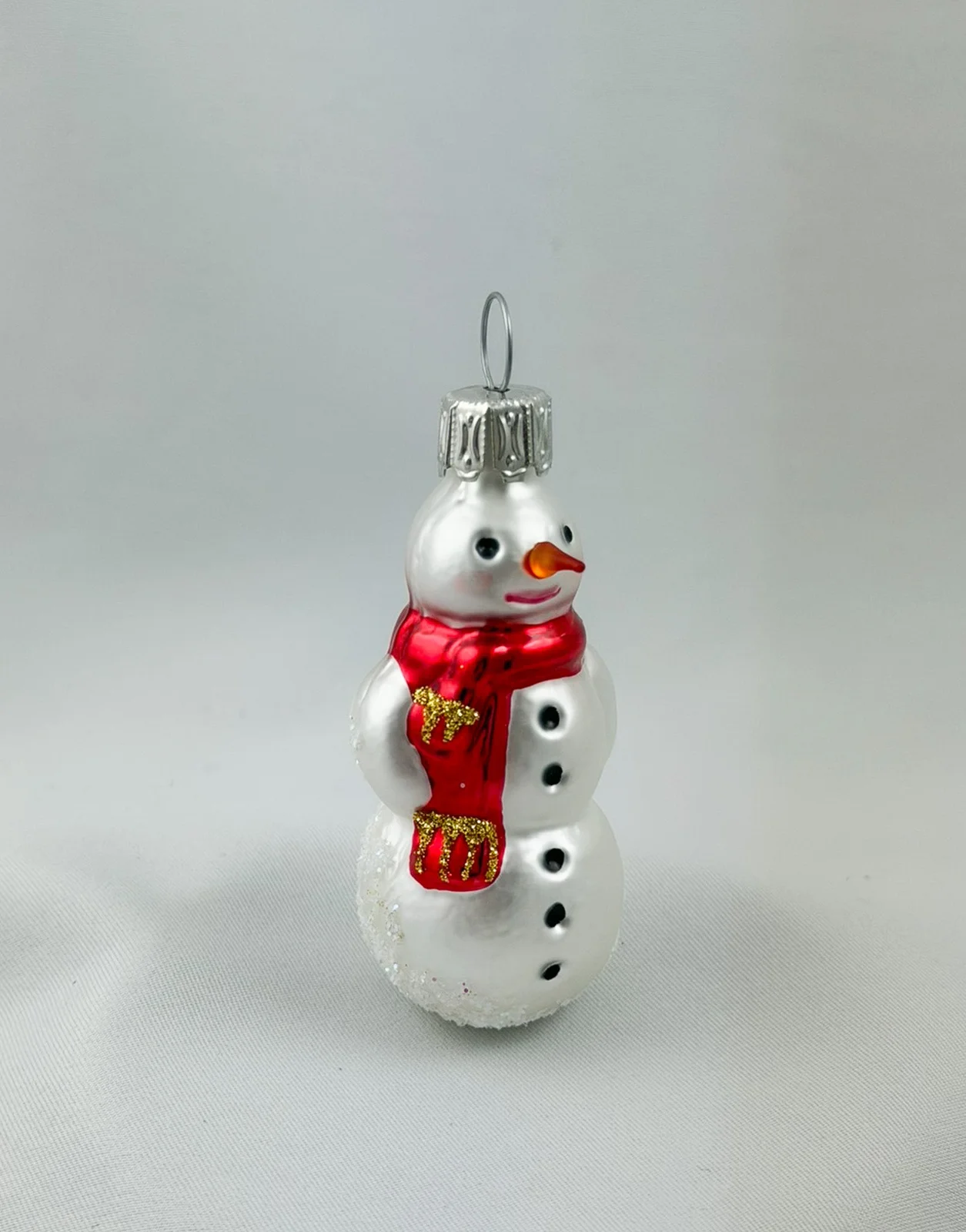 Wiktoria Kleiner Schneemann mit rotem Schal