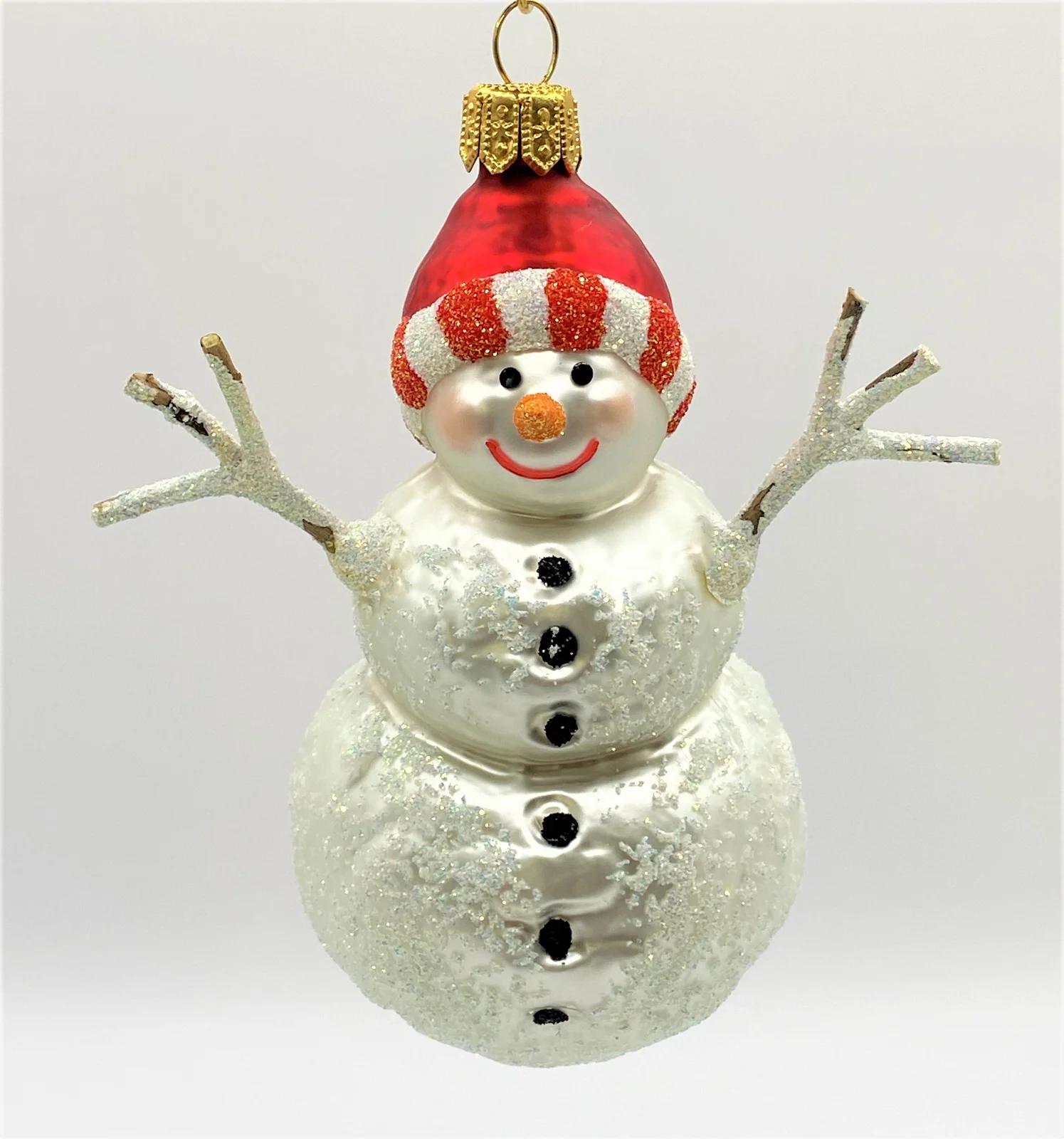 Hanco Schneemann mit roter Mütze