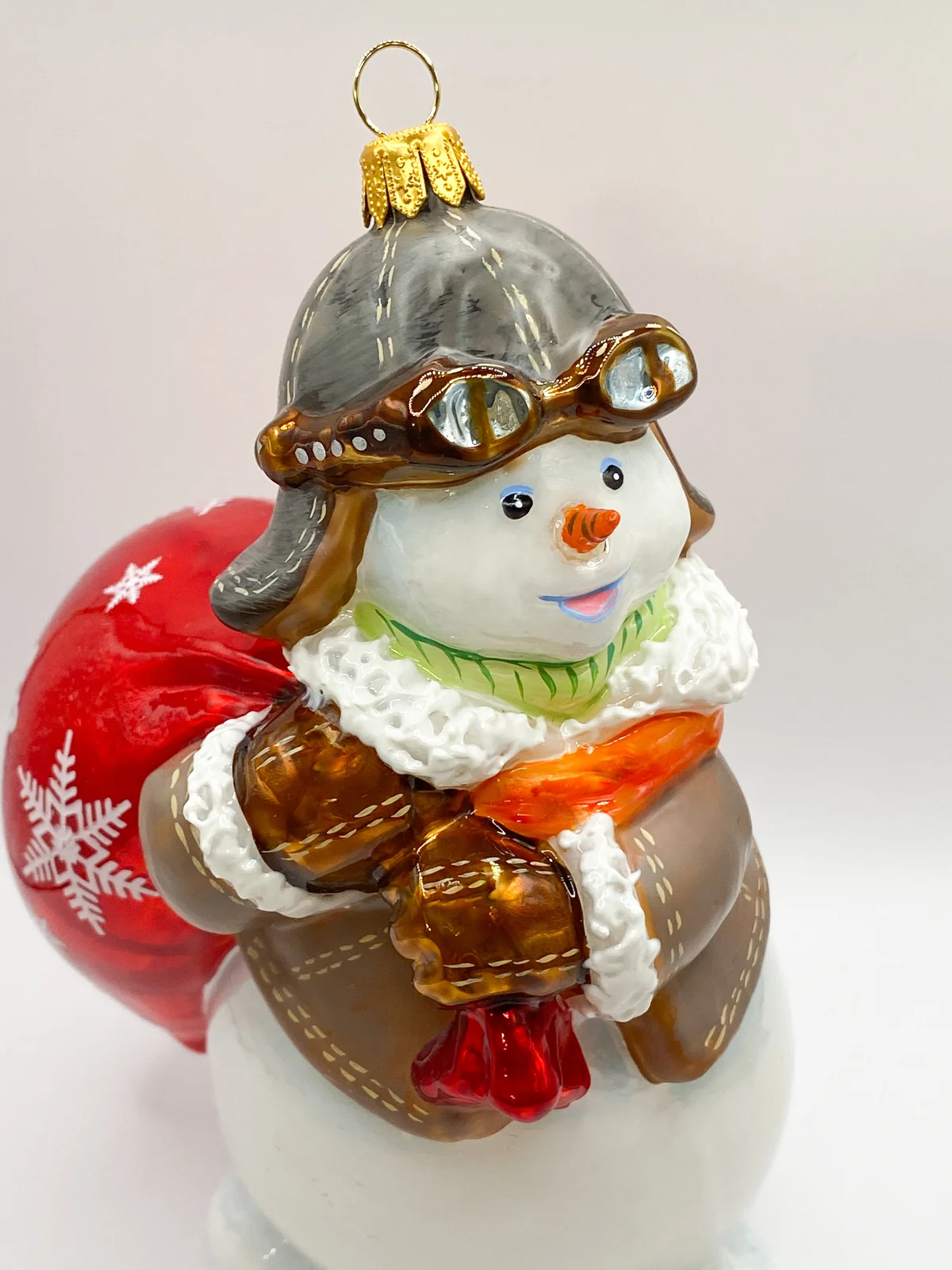 Komozja Schneemann mit Piloten-Mütze, KOMOZJA MOSTOWSKI