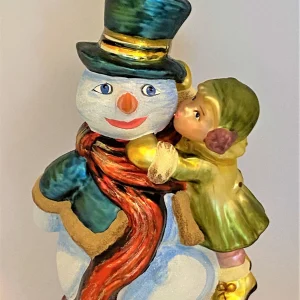 Komozja Kleines Mädchen gibt dem Schneemann einen dicken Kuss, KOMOZJA MOSTOWSKI