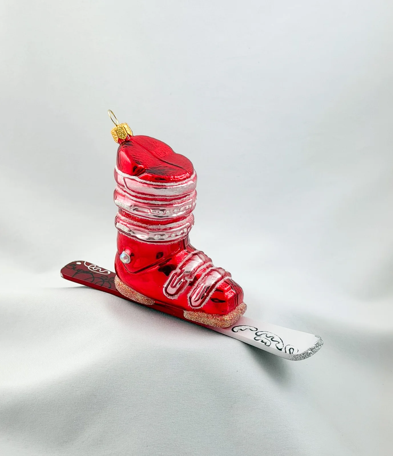 GMC Roter Ski-Schuh mit Ski