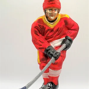 Hanco Schweizer Eishockey Spieler in rotem Trikot mit weissen Streifen
