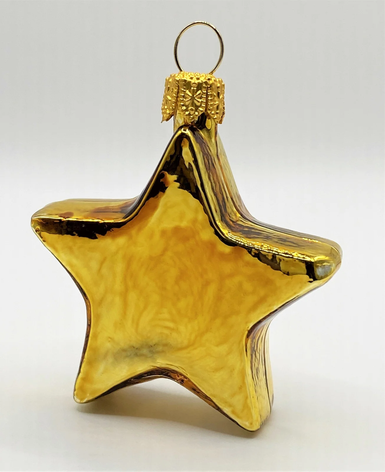 Glaspol Kleiner glänzender goldener Stern