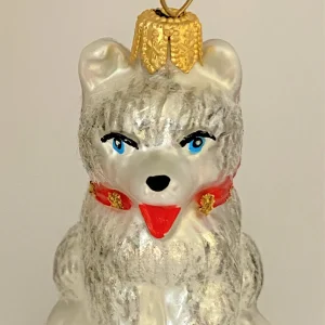 Impuls Kleiner Husky-Hund mit rotem Halsband