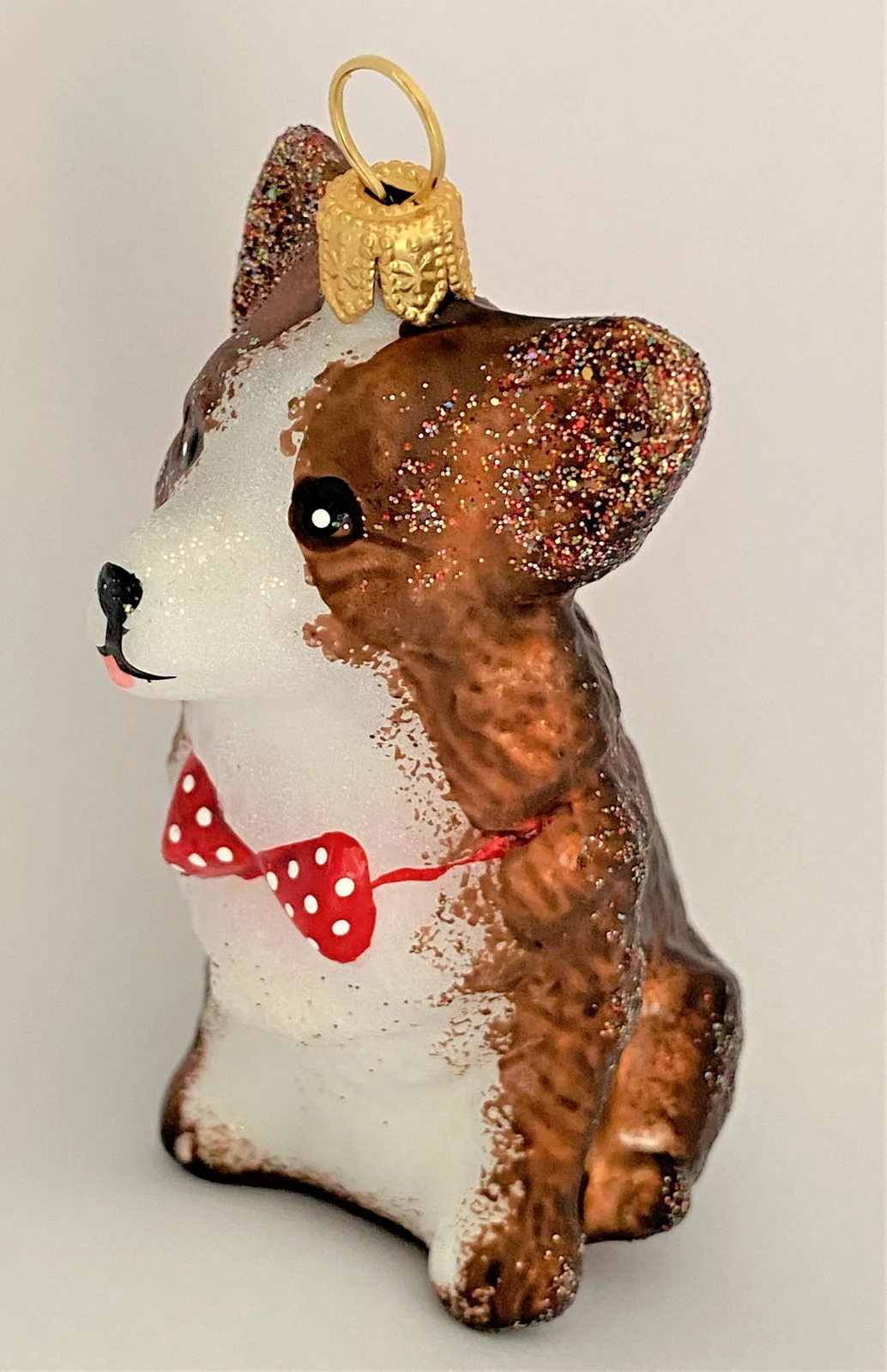 GMC Sitzender Corgi mit roter Fliege