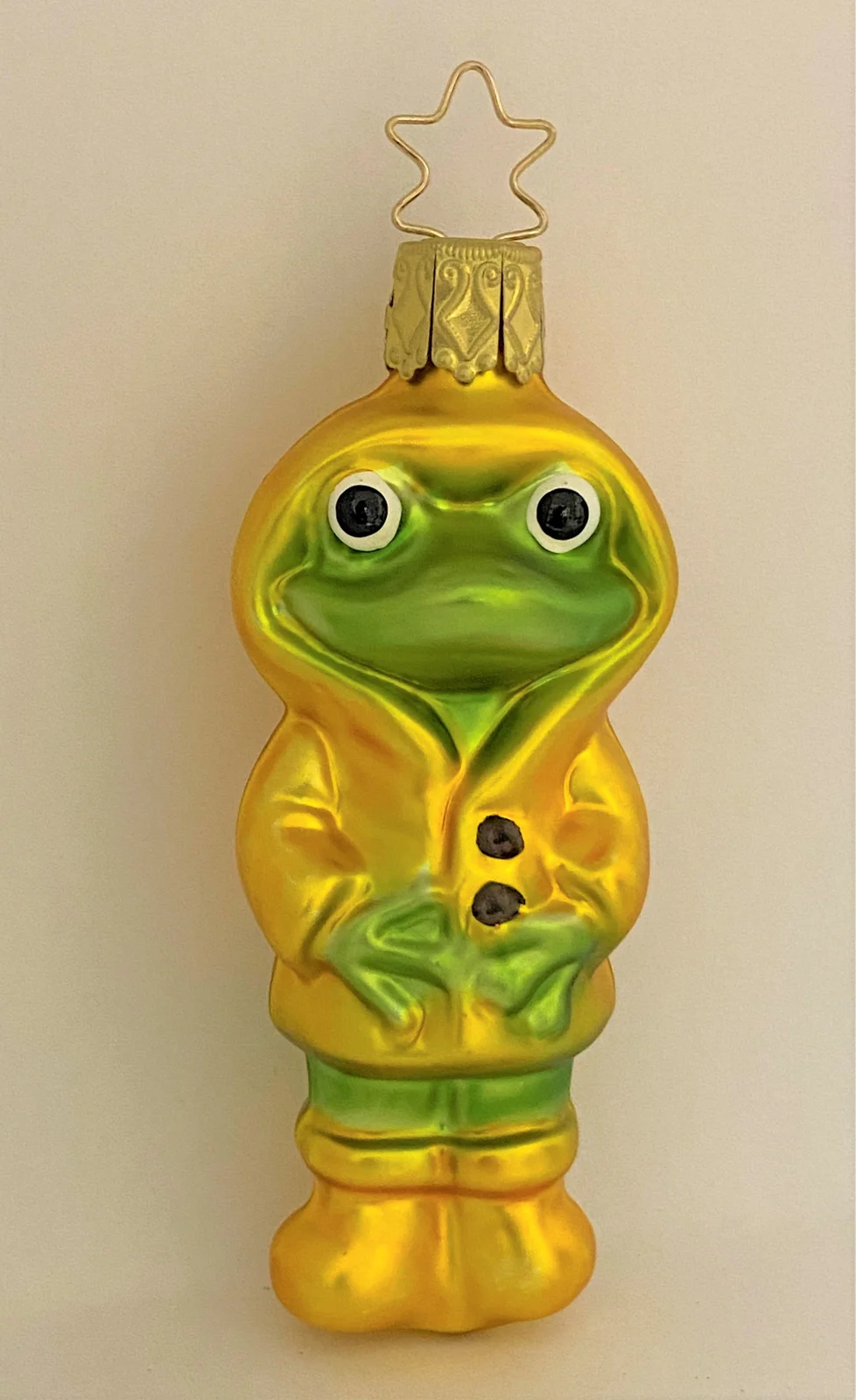 Inge-Glas Frosch im Regenmantel