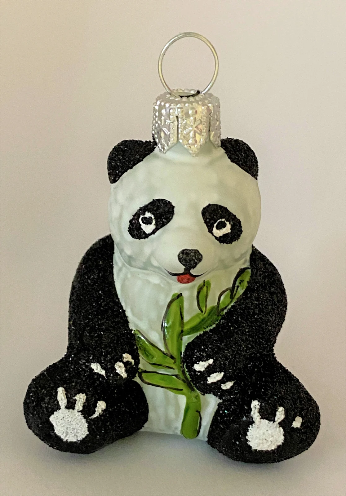 Glaspol Kleiner sitzender Panda