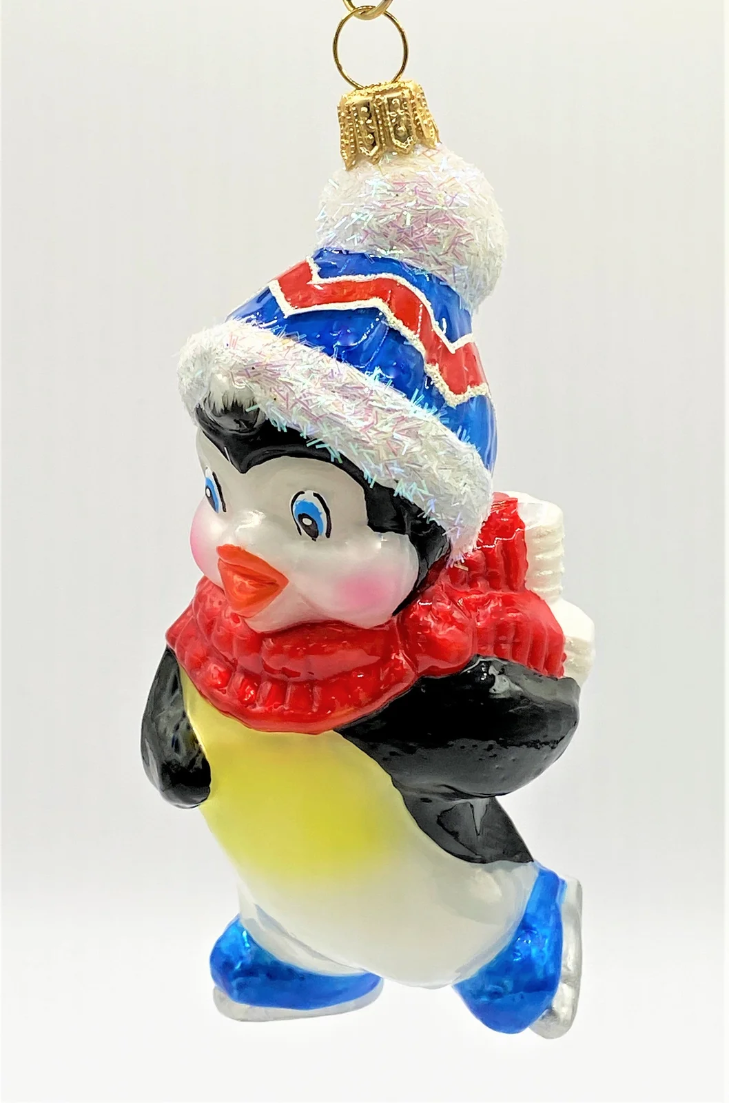 Impuls Pinguin ist mit den Schlittschuhen unterwegs