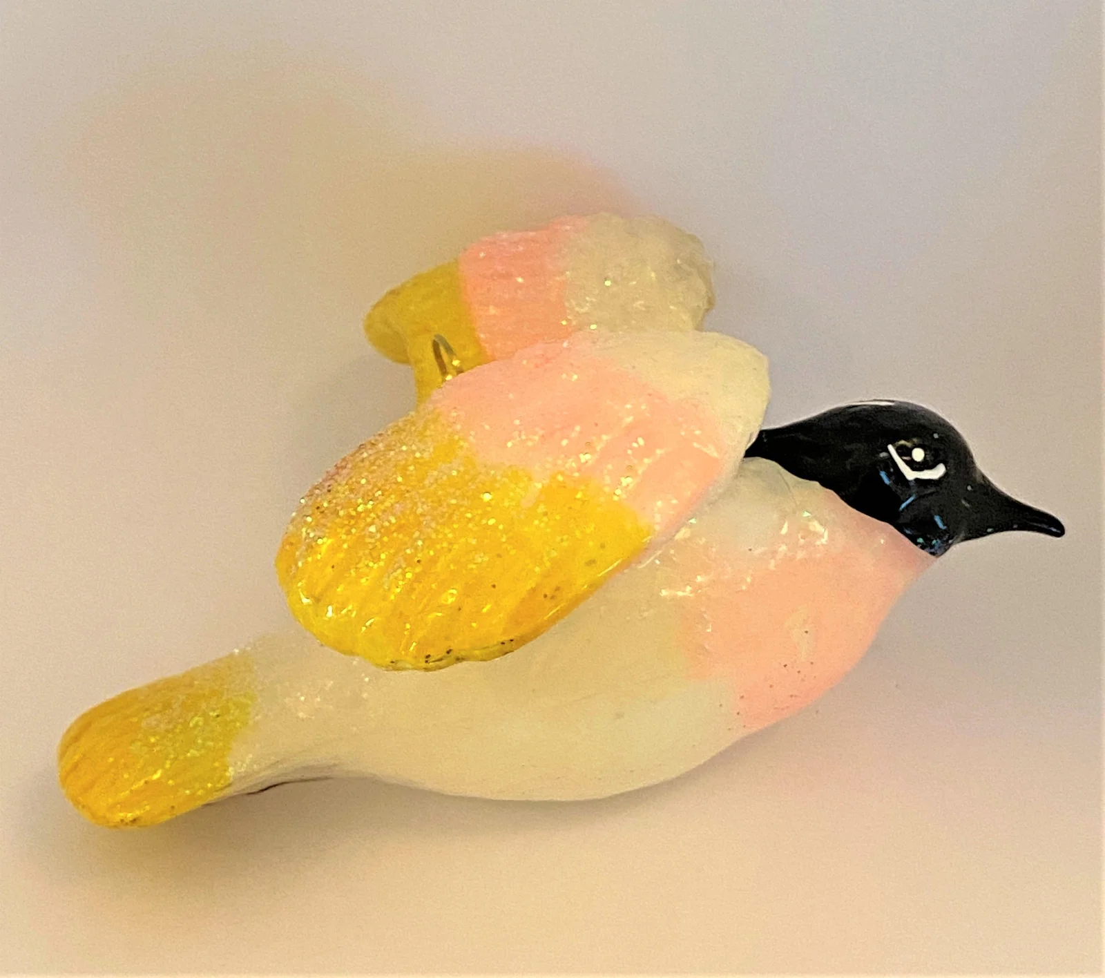 Koronex Fliegende Taube hell mit gelb-rosa Flügel