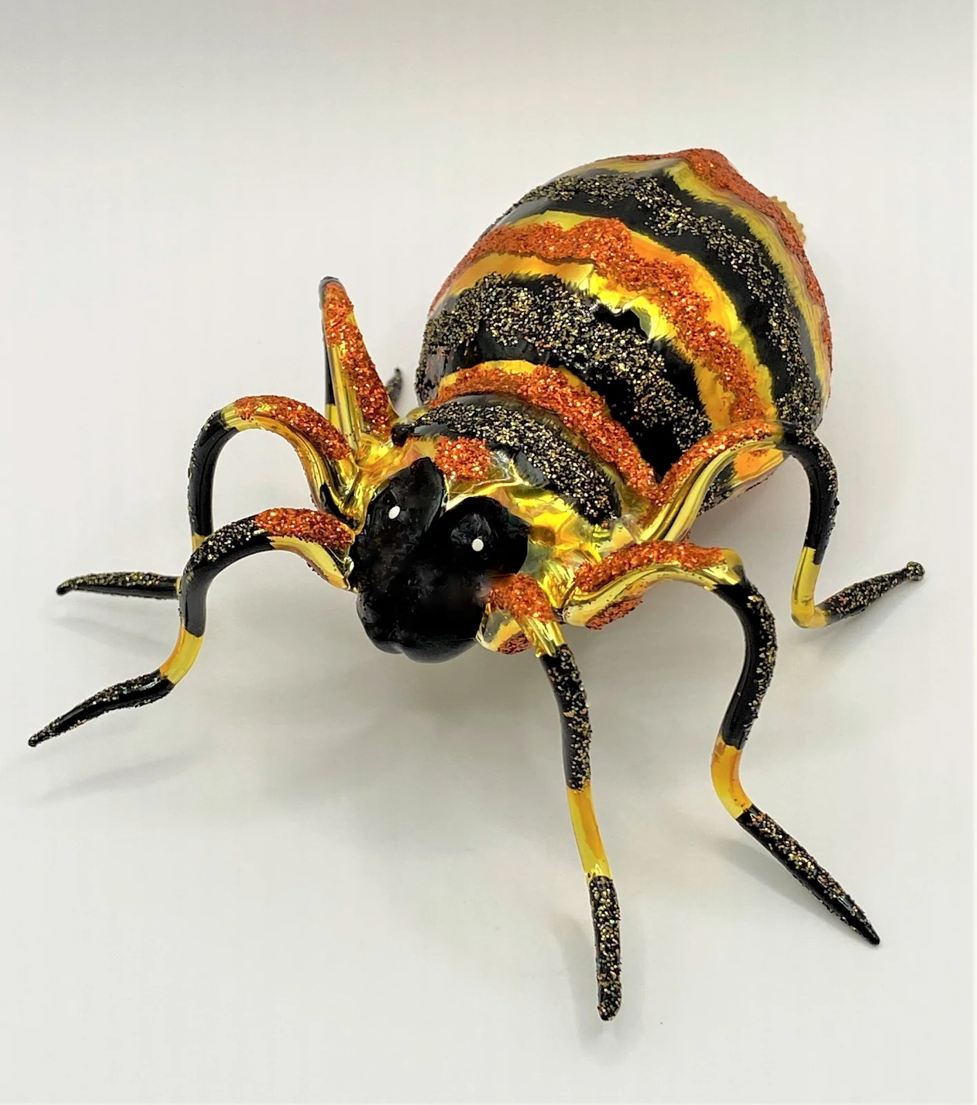 Wiktoria Spinne mit orangen und schwarzen Streifen