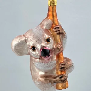GMC Flauschig brauner Koala-Bär klettert am Ast