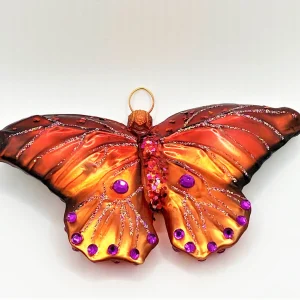 GMC Rostroter Schmetterling mit violetten Schmucksteinen