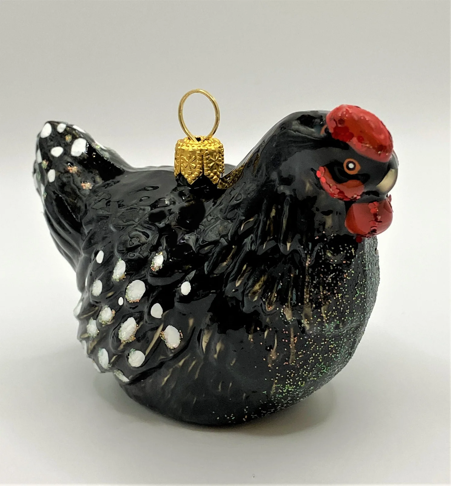 GMC Huhn schwarz-weiss getupft