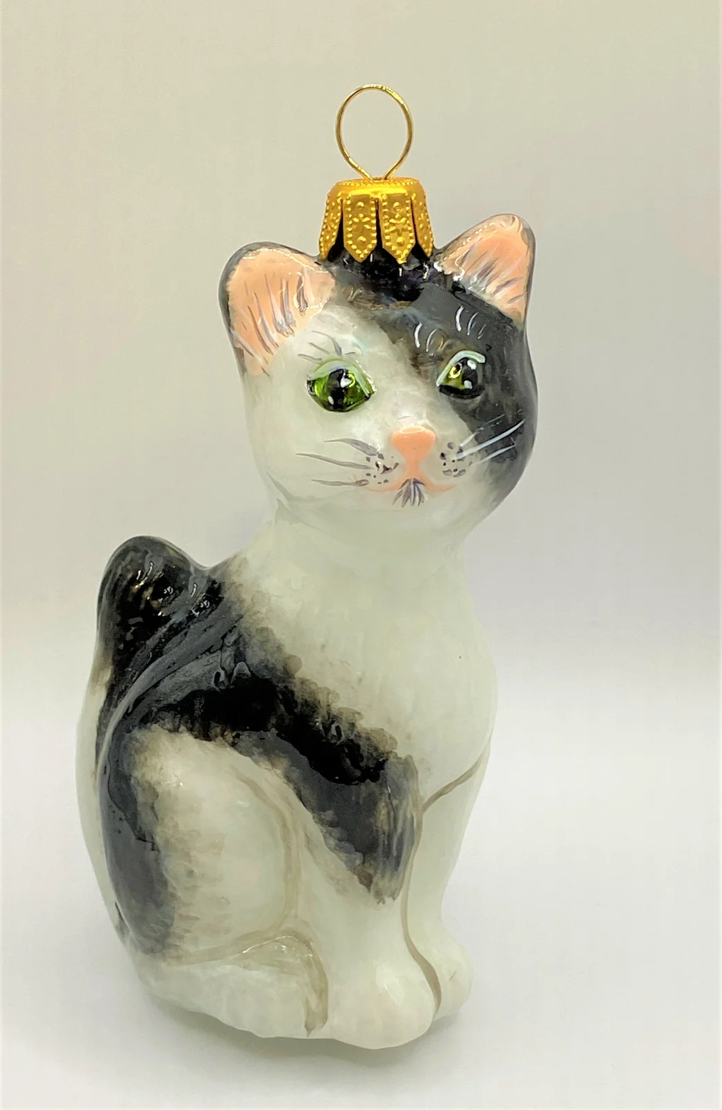 Komozja Schwarzweiss gefleckte Katze, KOMOZJA MOSTOWSKI