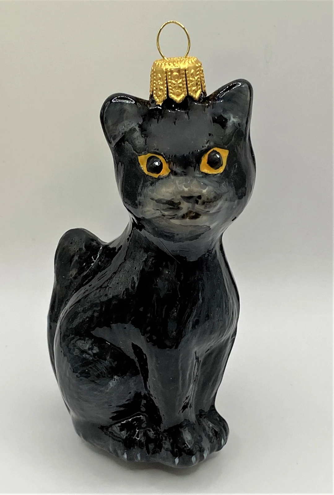 Komozja Schwarze Katze mit gelben Augen, KOMOZJA MOSTOWSKI