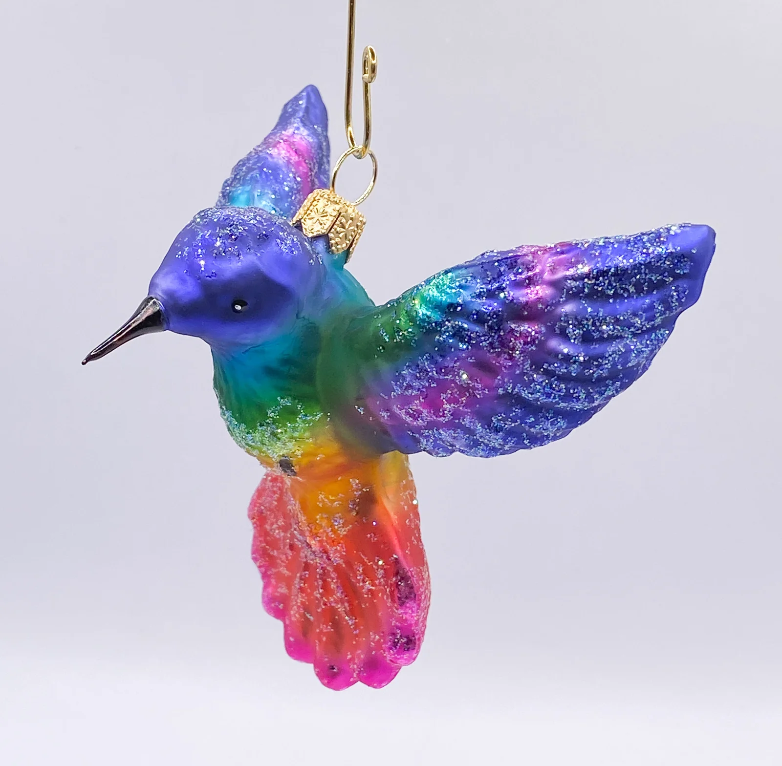Hanco Regenbogen farbener fliegender Kolibri
