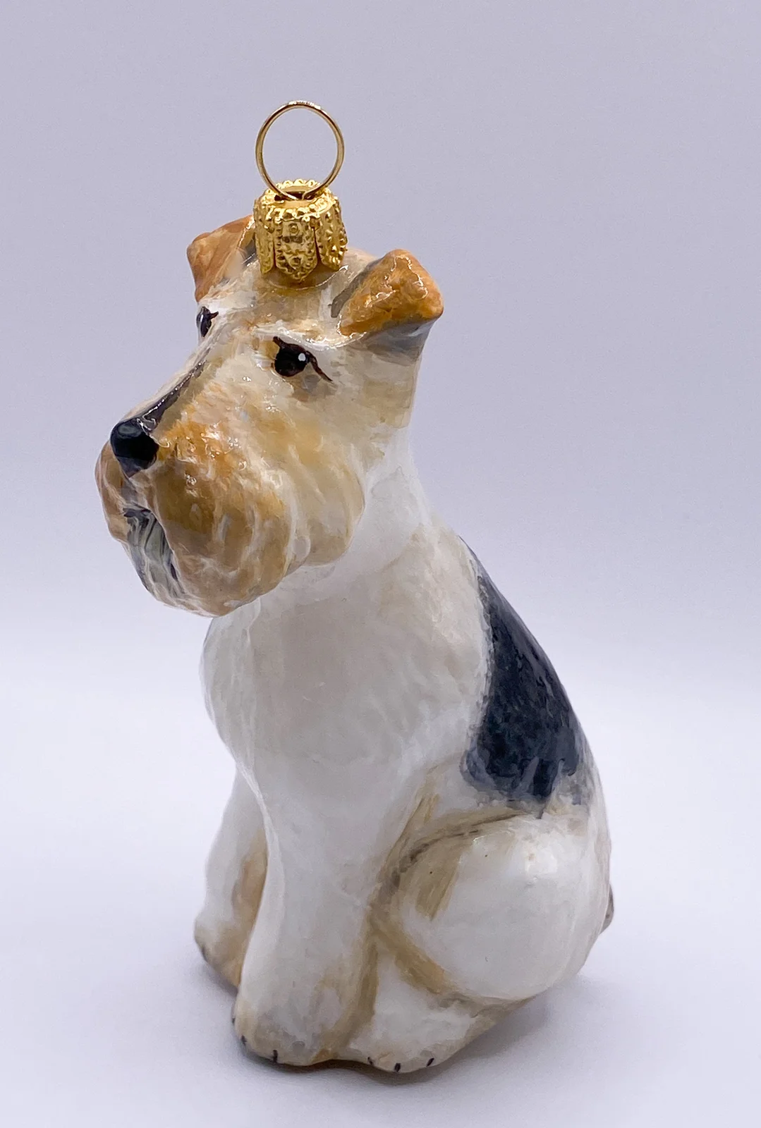 Komozja Sitzender Foxterrier-Hund KOMOZJA MOSTOWSKI