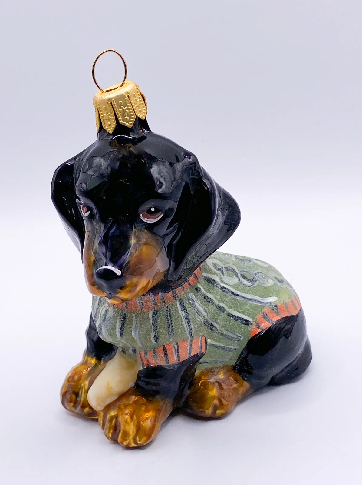 Komozja Schwarzer Dackel im grünen Mantel, Dachshund, KOMOZJA MOSTOWSKI