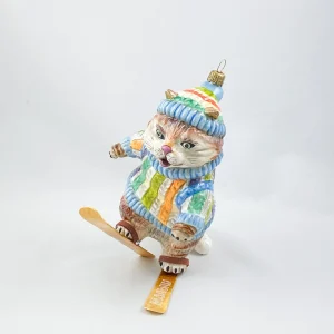 AtlasArt Die Katze im bunten Pullover versucht sich im Ski-Fahren ATLASART