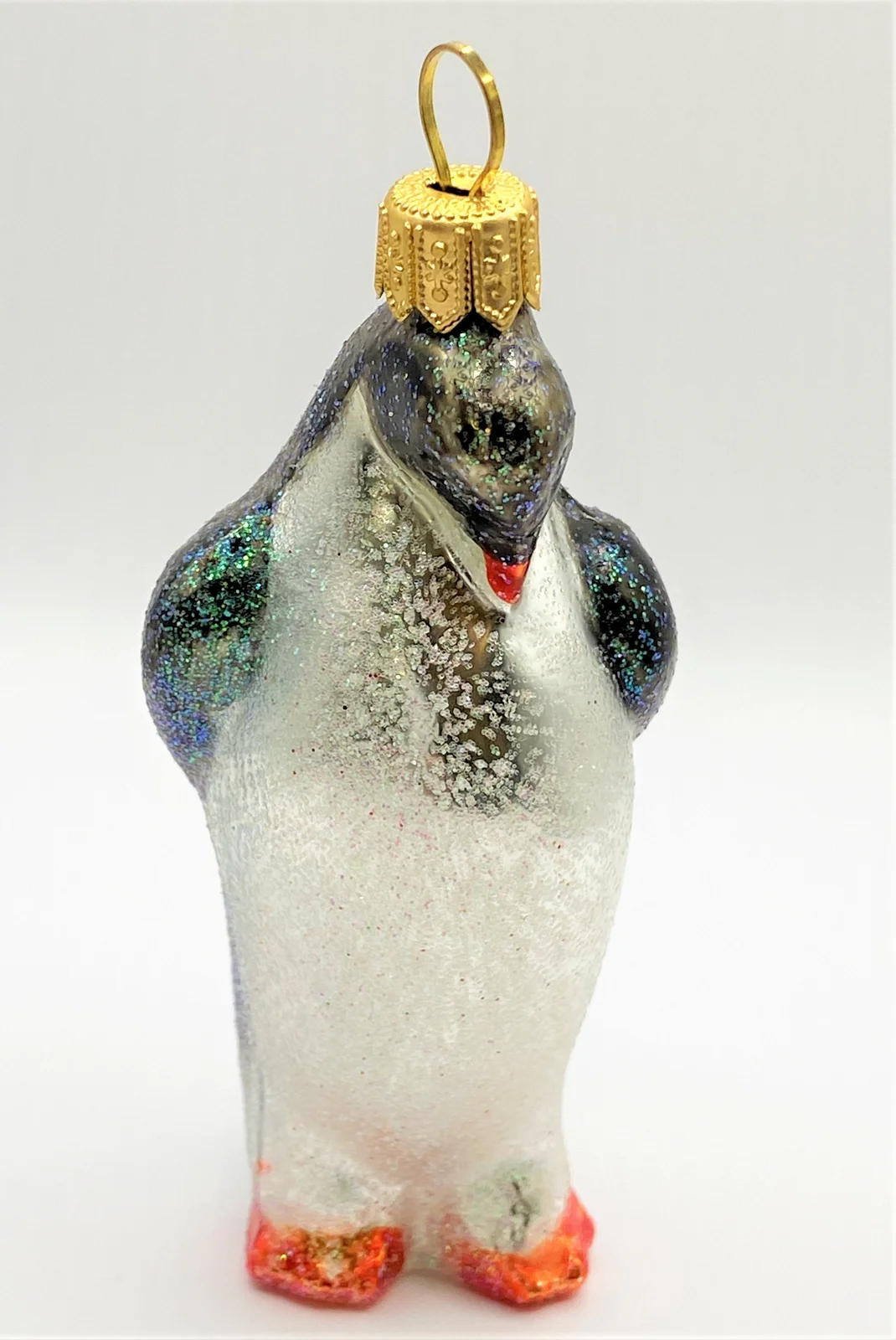 Sonstige Glitzer Pinguin mit gesenktem Kopf