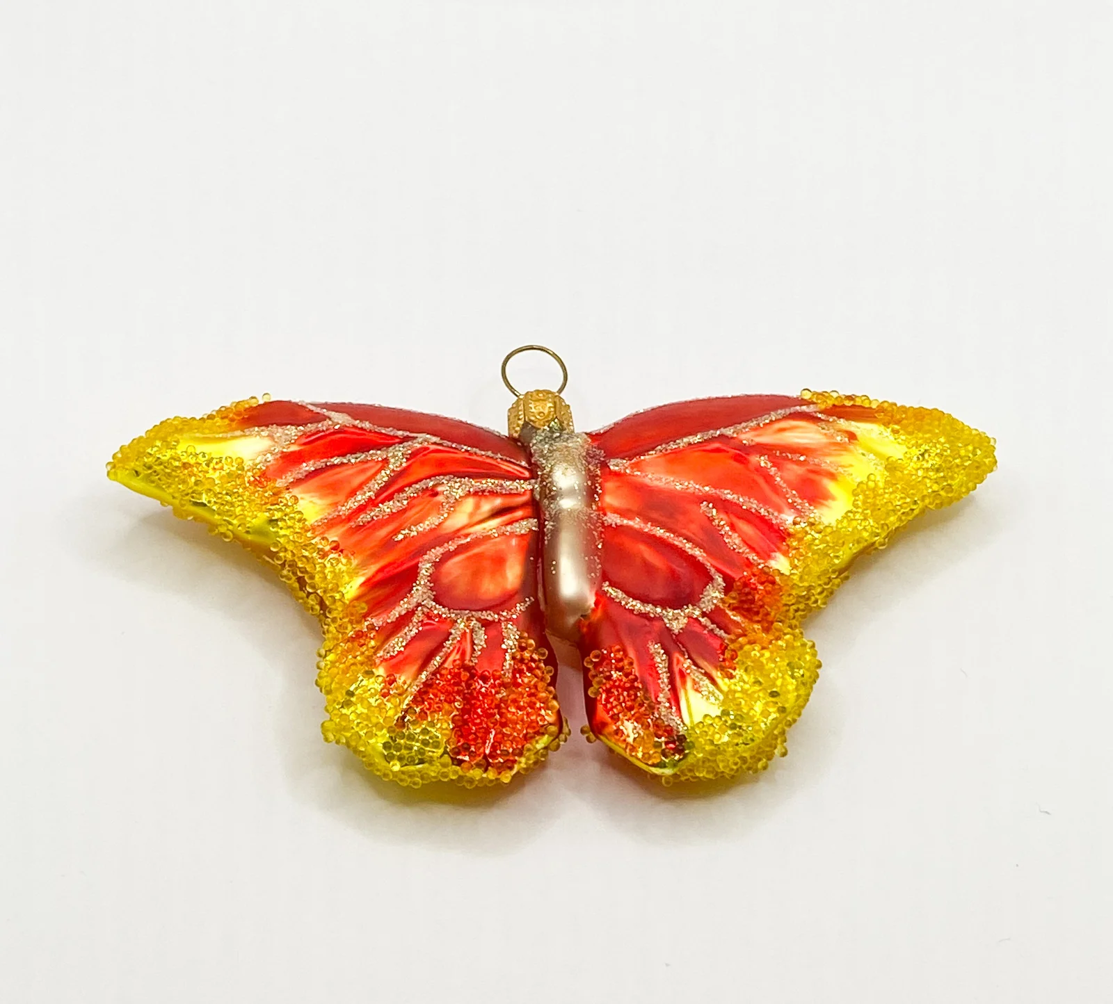 GMC Schmetterling dunkles orange mit gelben Flügelspitzen
