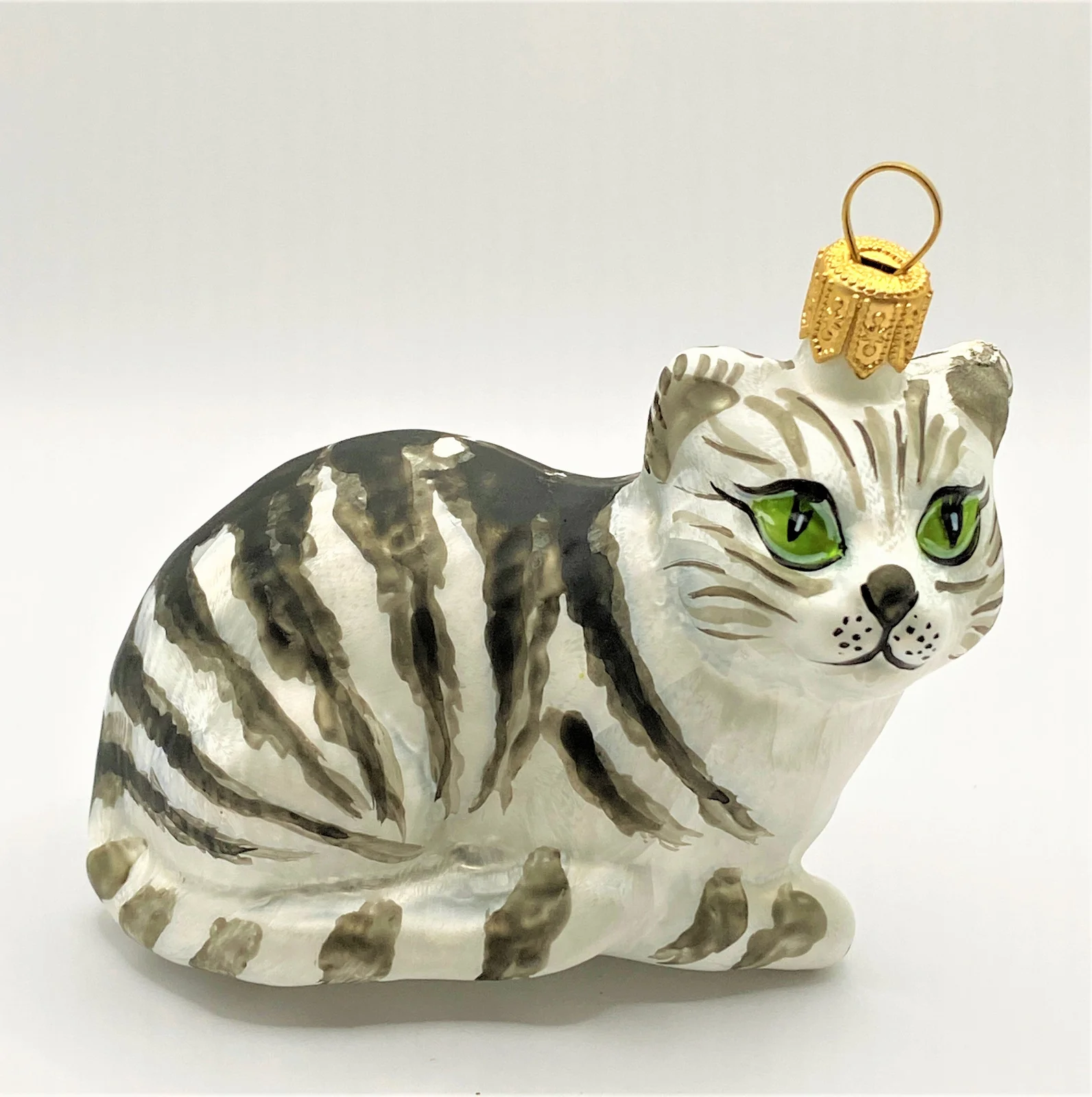 GMC Weisse Tigerkatze mit grünen Augen