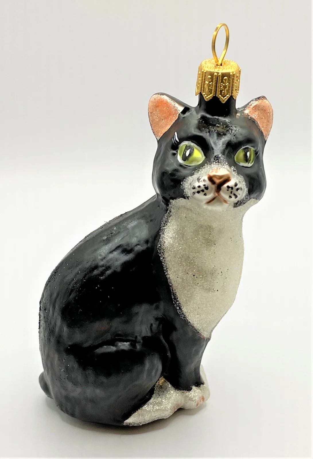 GMC Sitzende schwarze Katze mit weisser Brust