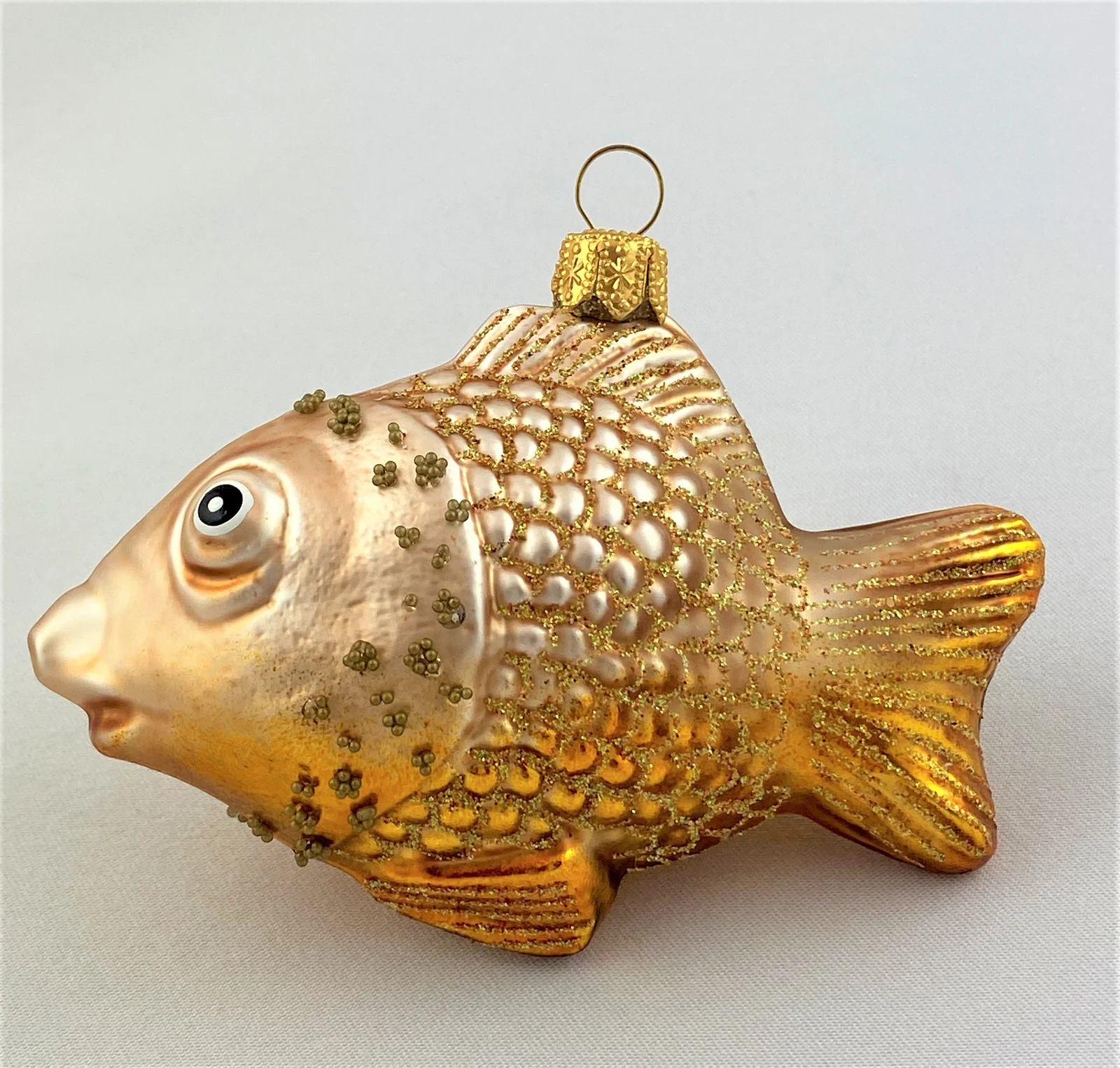 GMC Herziger gold/beiger Fisch