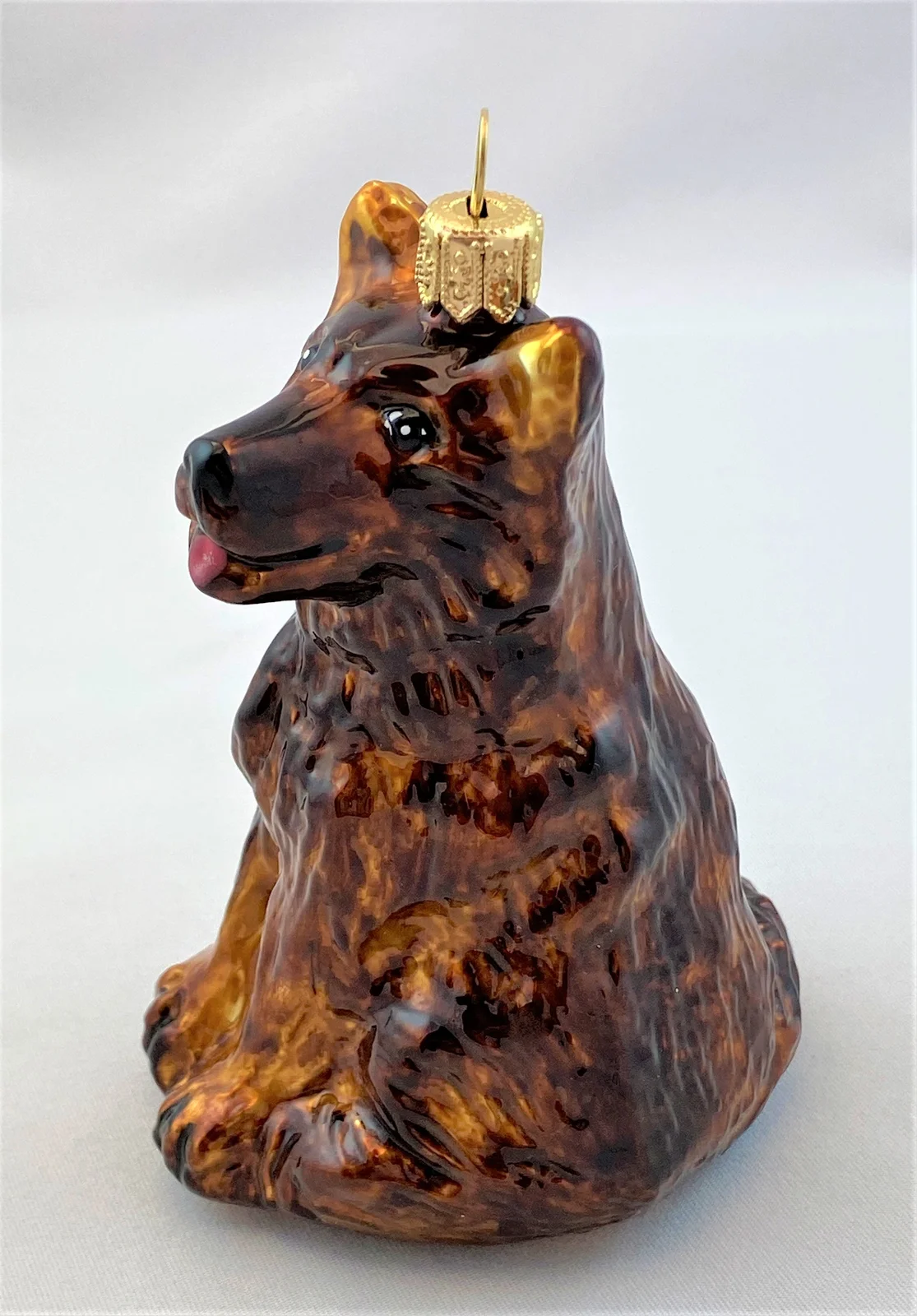 MaxGlass Sitzender brauner Hund