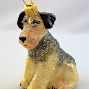 Sonstige Sitzender Airedale Terrier