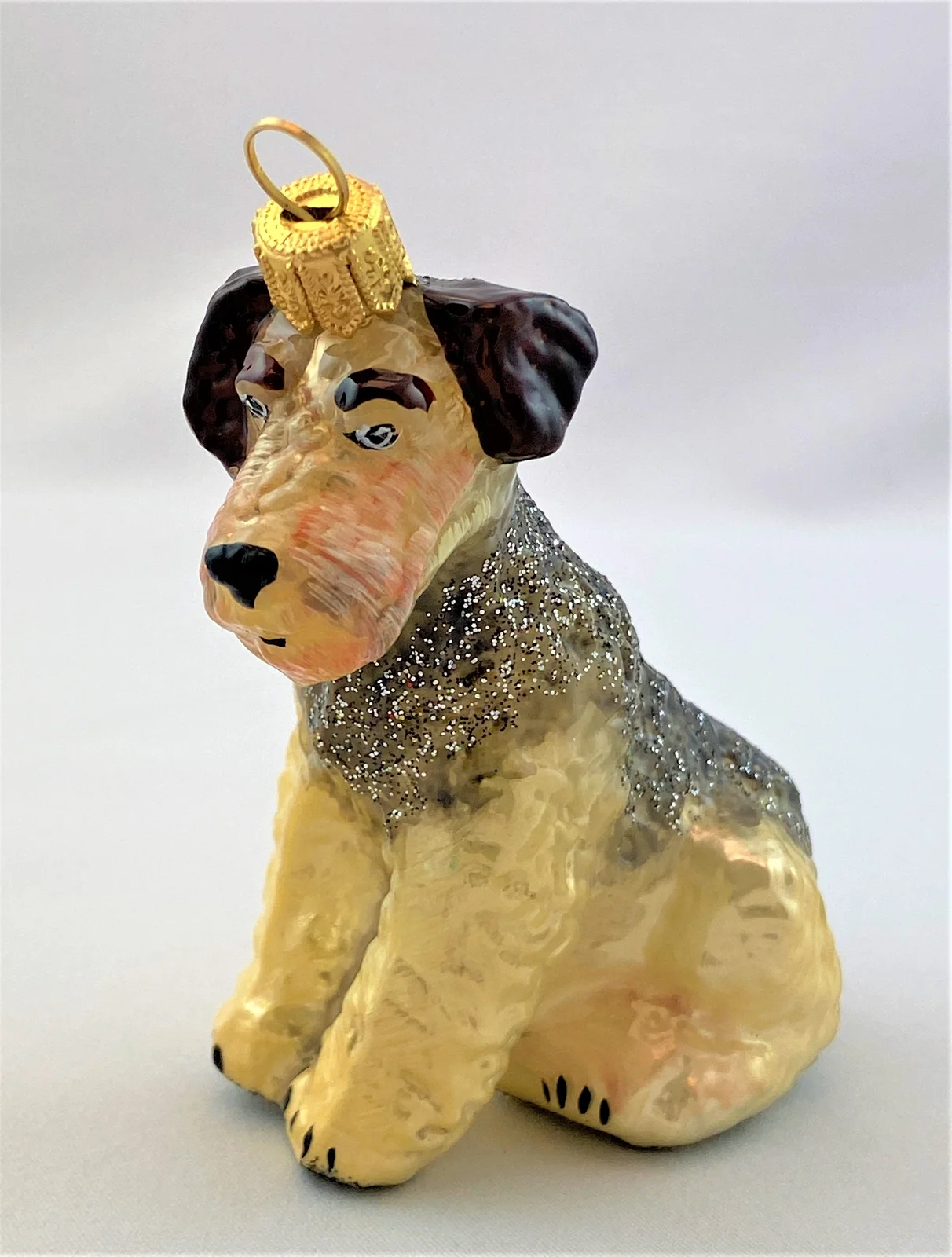Sonstige Sitzender Airedale Terrier