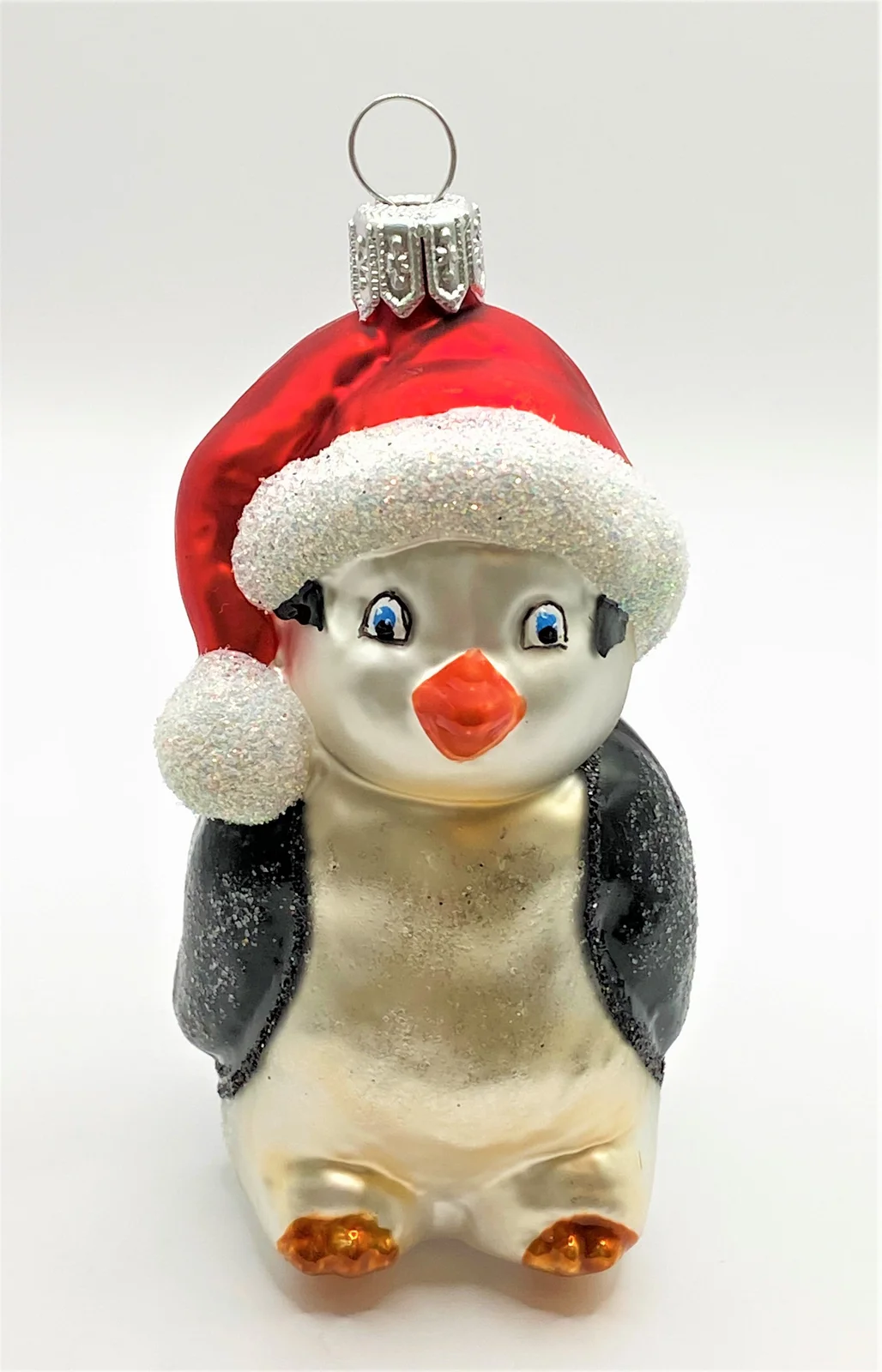 Hanco Pinguin mit roter Pudelmütze