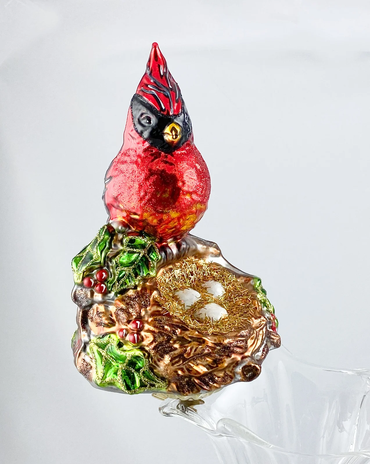 Glassware Roter Kardinal, Virgina Nachtigall sitzt vor dem Nest, auf Clip