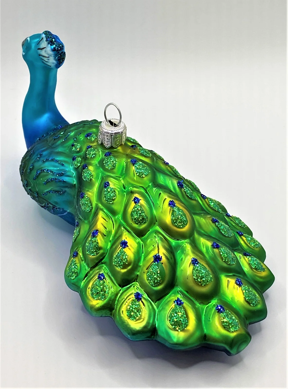 Hanco Sitzender Pfau