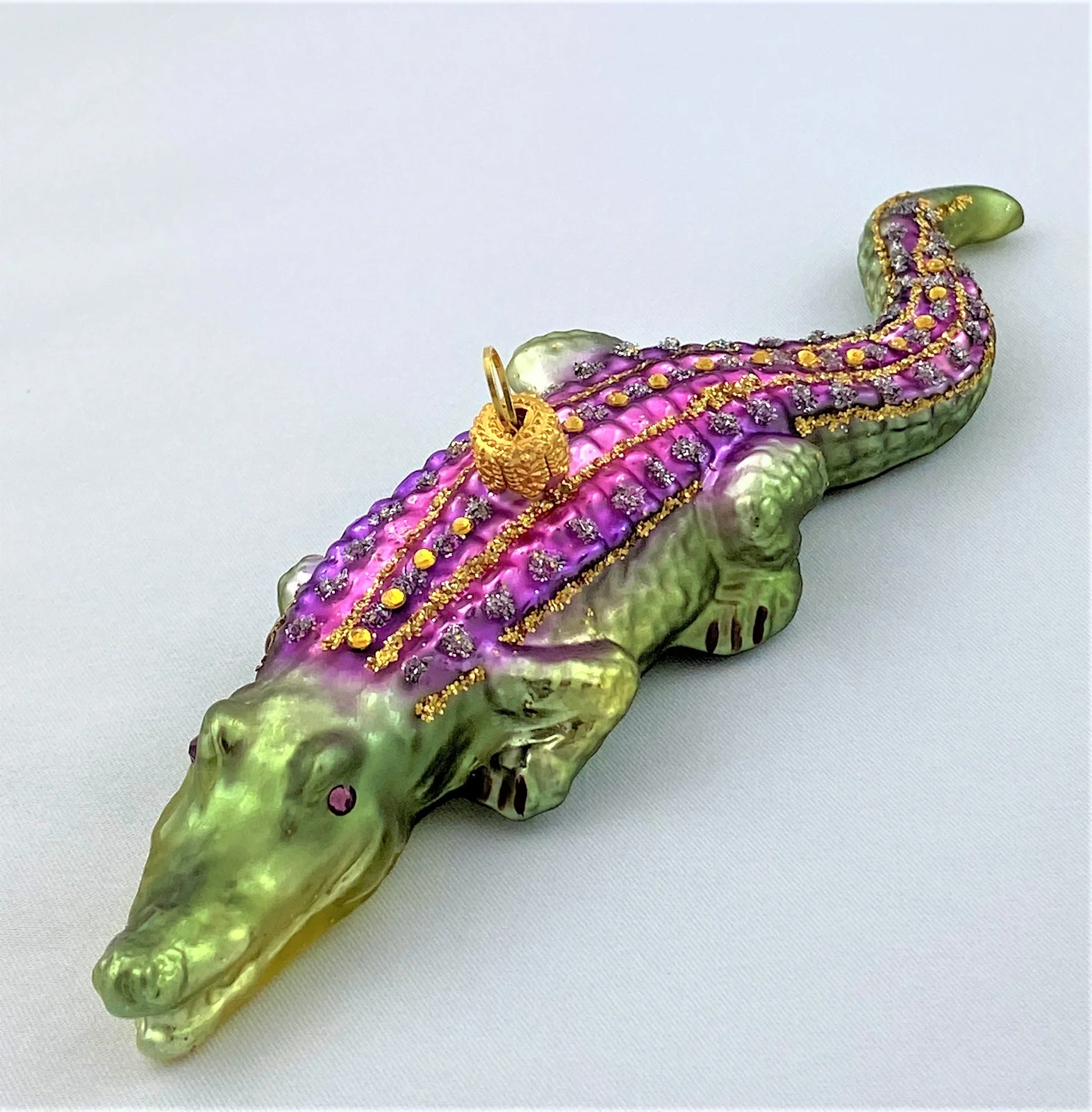 Hanco Krokodil, grün mit violettem Rücken