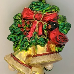 Glassware Roter Kardinal sitzt auf Weihnachtsglocken