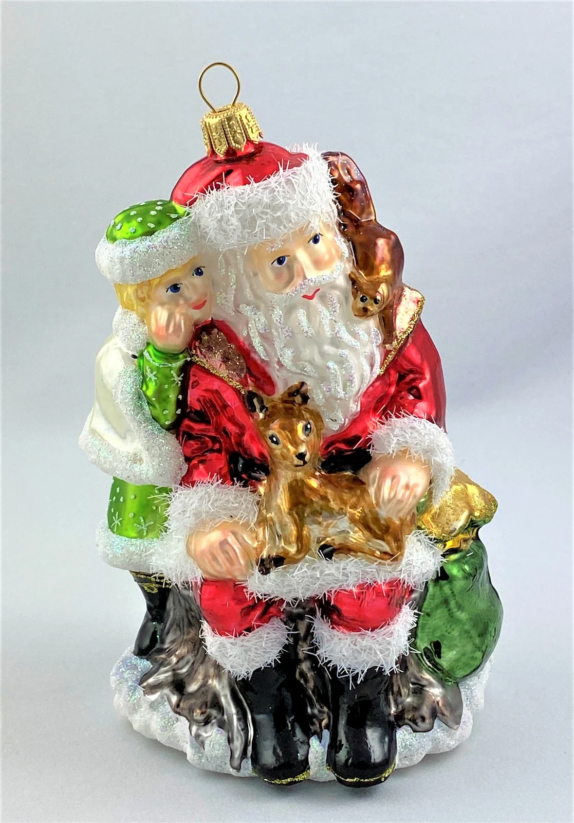Glassware Sitzender Santa mit Mädchen und Waldtieren