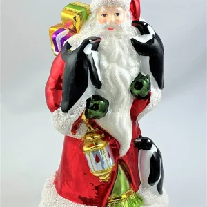 Glassware Weihnachtsmann bringt den Pinguinen die Weihnachtsgeschenke