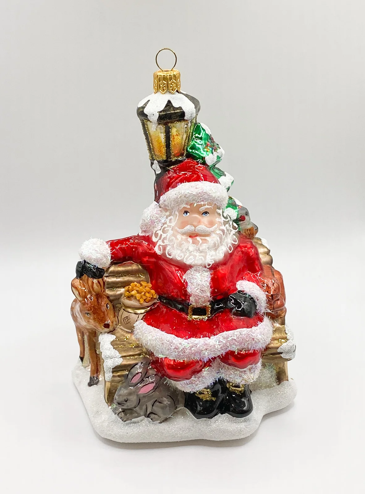Impuls Santa auf der Parkbank mit den Waldtieren