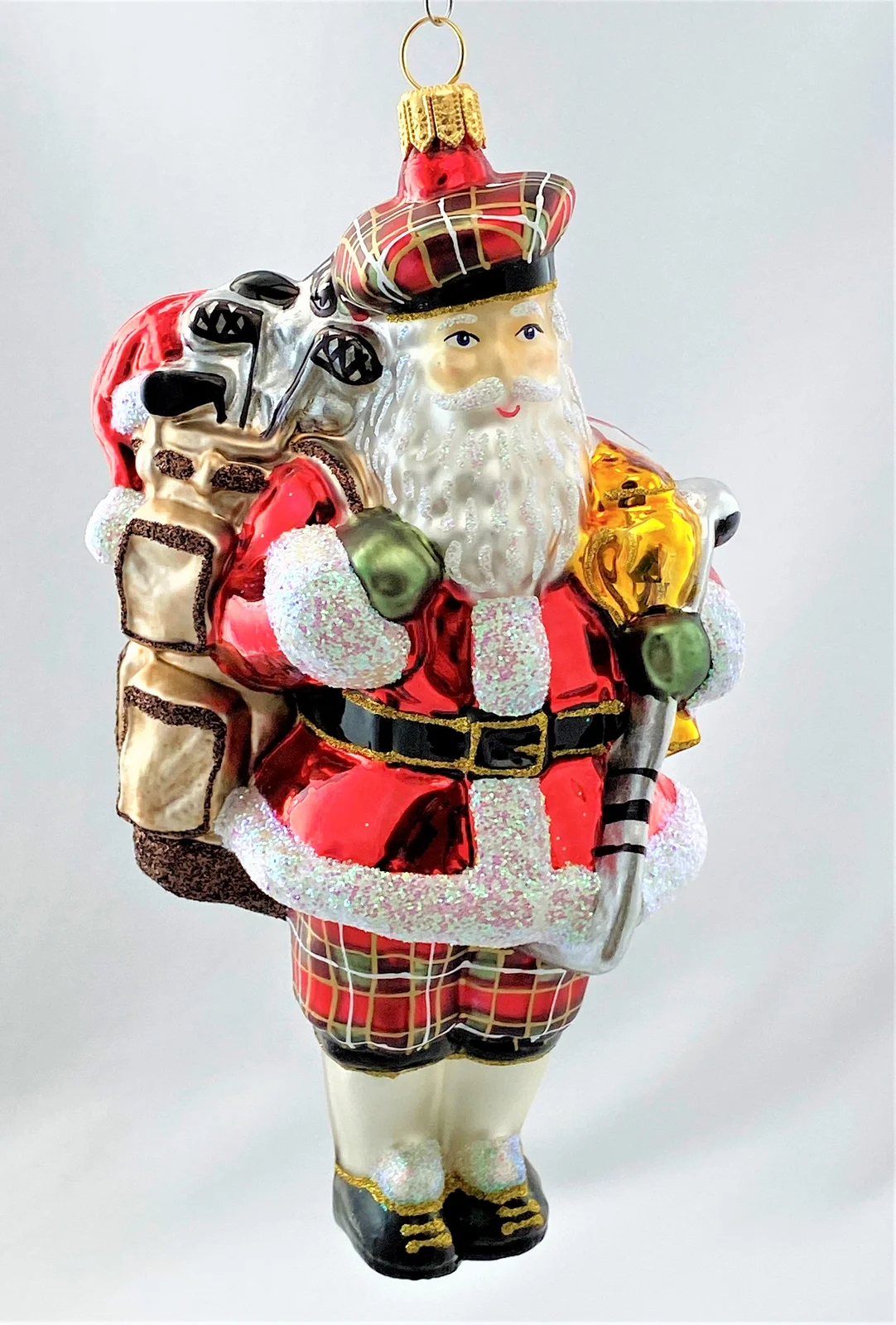 Glassware Der Weihnachtsmann erfreut sich am Golf spielen