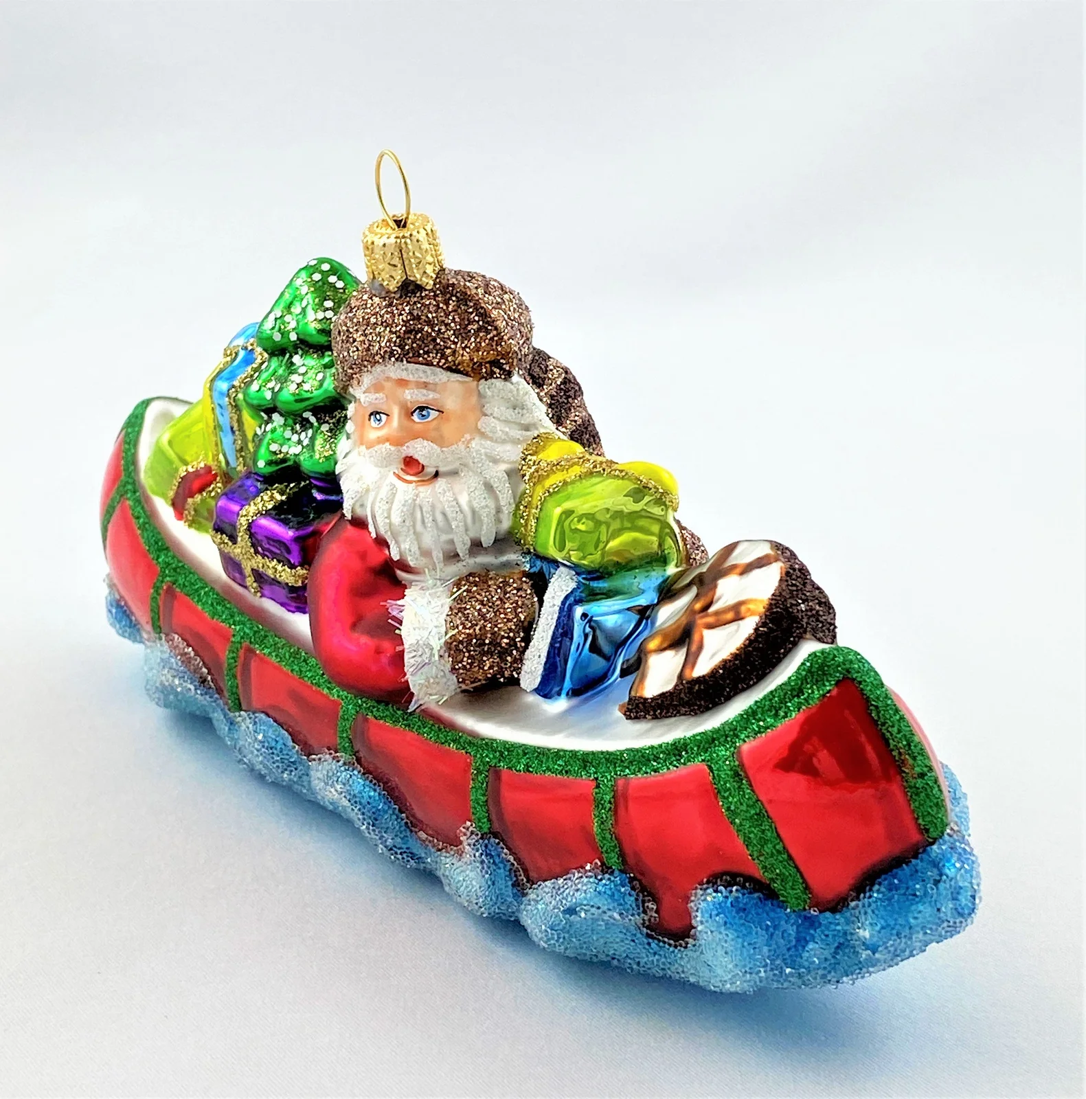 Impuls Santa Claus bringt die Geschenke mit dem Kanu