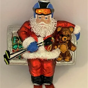 Impuls Santa fährt mit dem Sessellift zum Ski-Fahren
