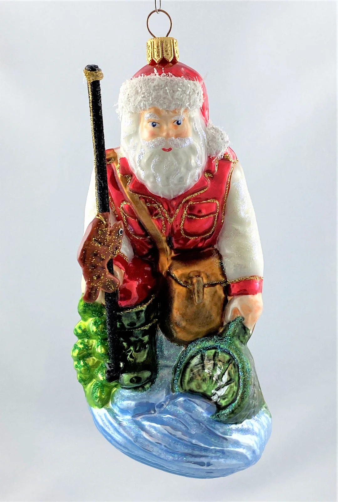 Glassware Weihnachtsmann fängt Fische mit dem Kescher